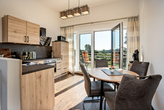 Ferienwohnung in Börgerende - Appartement 5 - Traumblick - Küche mit Blick Südbalkon